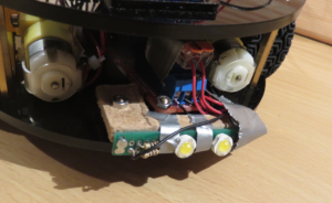 The headlights augmentation consists of a relay breakout board and a pair of power LEDs.