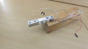 Load cell mounted on squared timber.