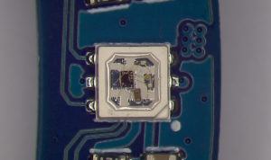 WS2813B-Mini RGB chip mounted on an LED ring.